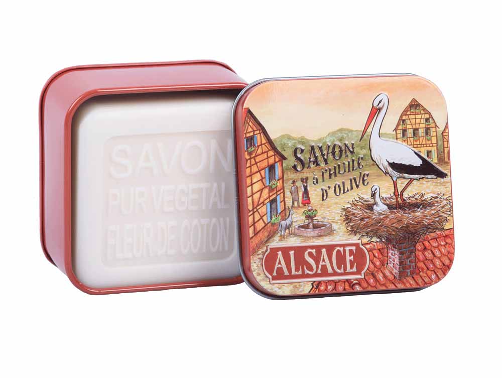 Embrace the iconic Alsacian symbol with La Savonnerie de Nyons' Cotton Flower Soap, presented in a 'La Cigogne' tin, depicting a stork and its nest, a symbol of happiness and prosperity.