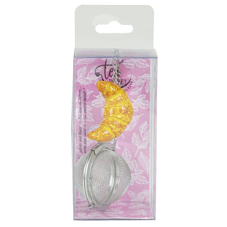 A fancy tea ball that has a miniature "croissant" made out of a metallic resin attached to the end of its chain. Because it is made of stainless steel, it will be appropriate for the brewing of any and all varieties of tea.